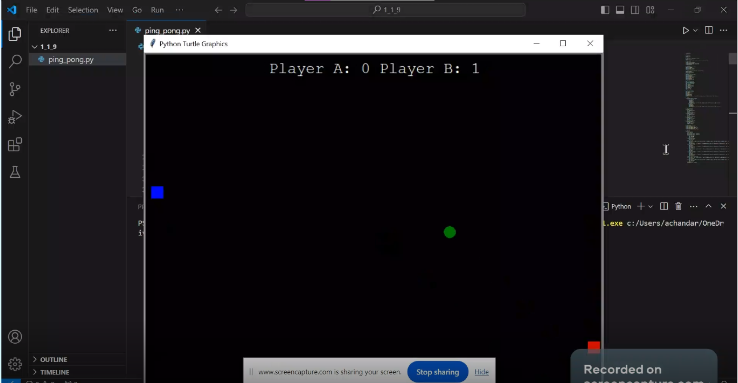 A picture of the ping pong game I coded. It has a point system at the top of the screen with both players (squares) at opposite sides, left and right. There is a green ball bouncing back and forth between the players.